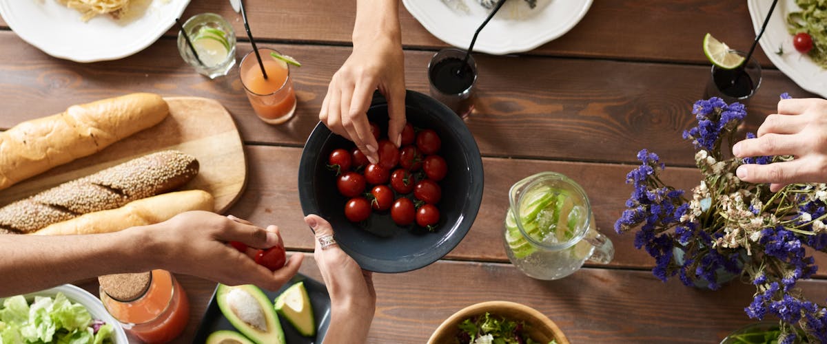 Modern POS terminal at restaurant host stand showing table layout