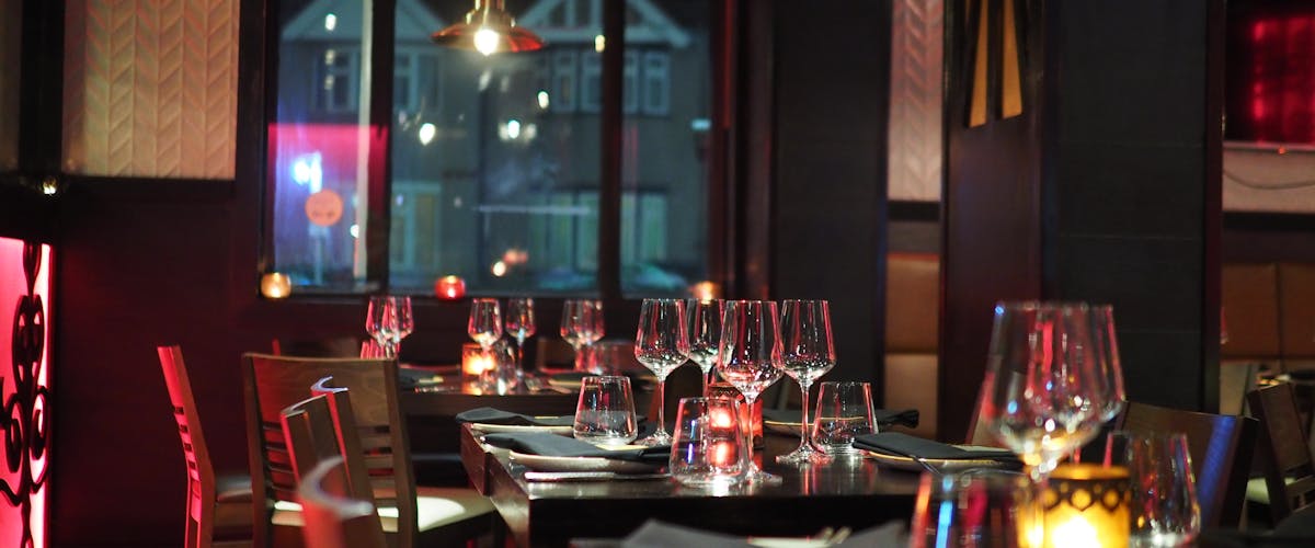 Diverse restaurant interior showing different table configurations for various dining styles